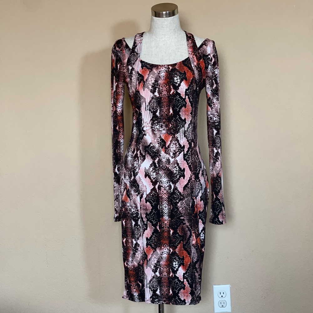 Jennifer Lopez snake skin design midi dress with peek-a-boo shoulder detail.
